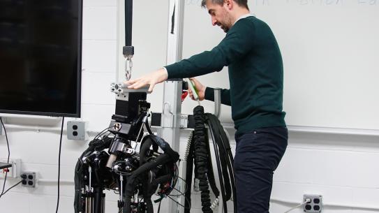 Professor  Righetti working in robotics lab