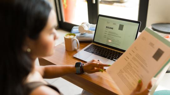 A student reviewing her Resume