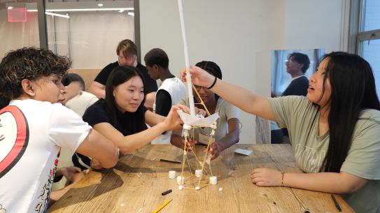 4 students of the k12 program participating in a project