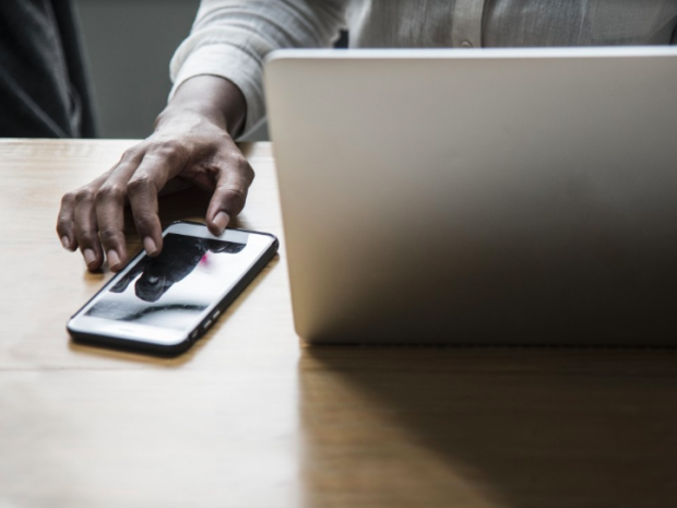 computer , cell phone and hand