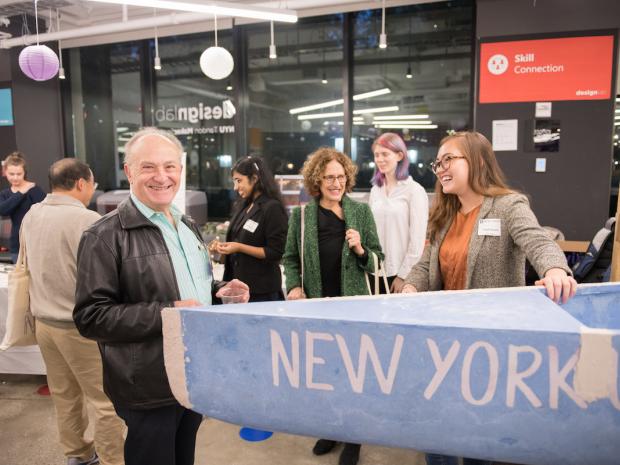 alum at makerspace with concrete canoe