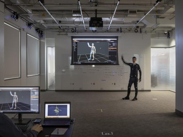 Professor Paul Torrens demonstrates motion capture technology. 