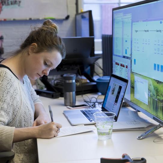 female student at computer female student at computer