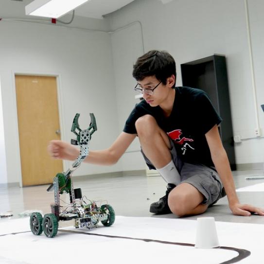 STEM student with robot STEM student with robot