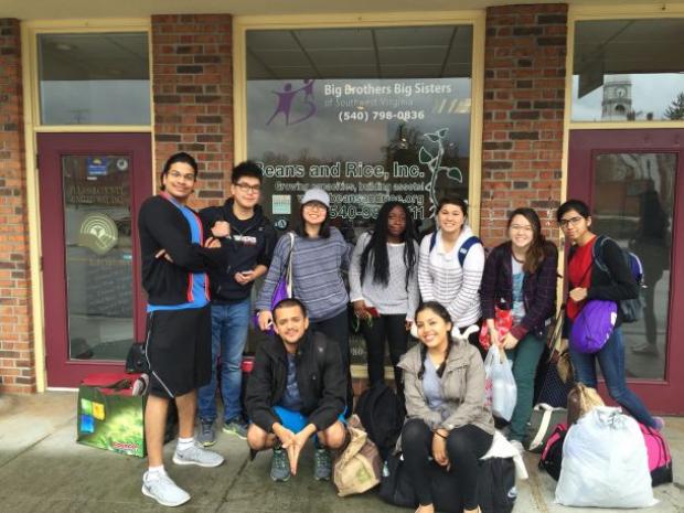 Group picture of students doing community service Group picture of students doing community service