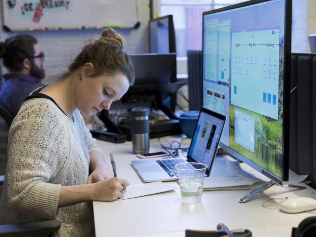 female student at computer female student at computer