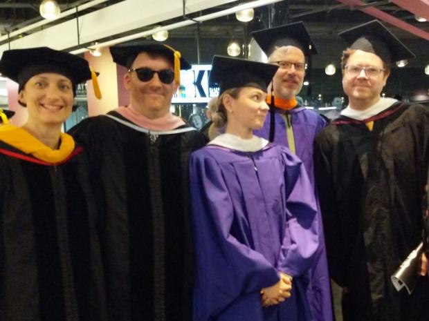 group of faculty in academic gowns group of faculty in academic gowns