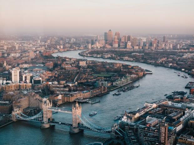 An overhead view of London's bridge and river. 