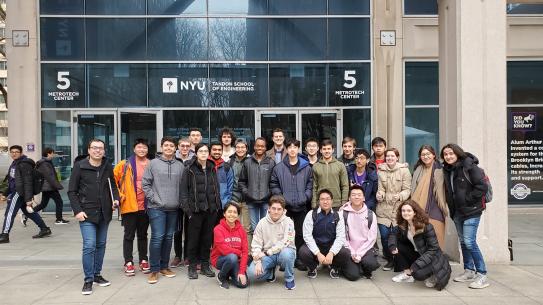 Team of students standing in front of 5 MetroTech Center, NYU Tandon Dibner Library 